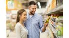 Couple doing grocery shopping in a shopping mall