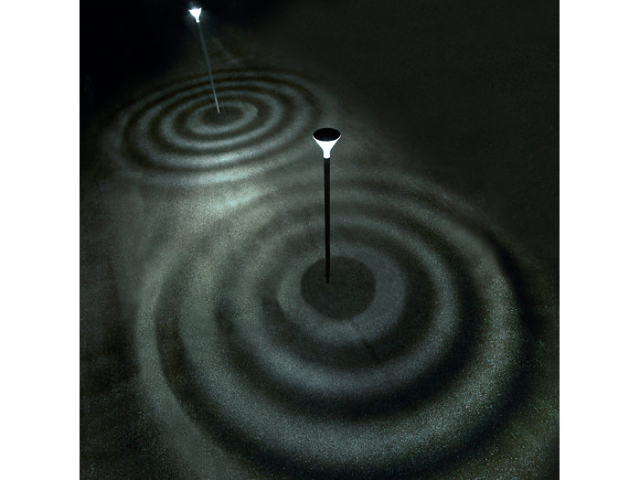 Unique, innovative lighting effect of circles on the ground, creating a modern look