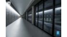 Glass hallways with sensor lights during the evening