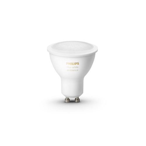 White GU10 smart LED bulb with a matte finish, labeled Hue white ambiance, featuring a compact, rounded shape and visible prongs.