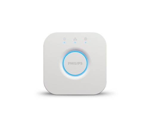 Square white smart lighting hub with rounded corners, matte finish, central button, blue LED ring, and three indicator icons on top.