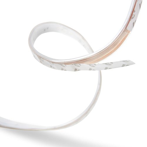 Flexible LED light strip with a white finish, adhesive backing visible, showing compact and slim design with no switches or ports.