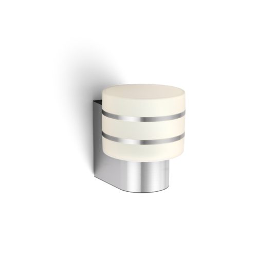 Tuar wall lantern, cylindrical shape, stainless steel finish, frosted white diffuser, visible horizontal metallic bands.