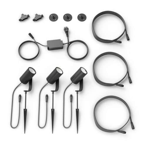 Collection of black outdoor smart spotlights with stakes, power adapter, connectors, mounting plates, and extension cables on white background.