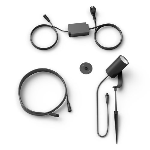 A black outdoor spotlight with ground stake, power adapter, two cables, and a circular mounting plate on a white background.