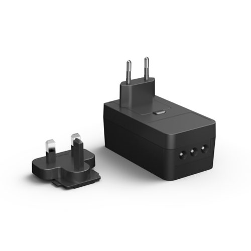 Black rectangular power adapter with matte finish, featuring two plug types and three visible ports on the front side.