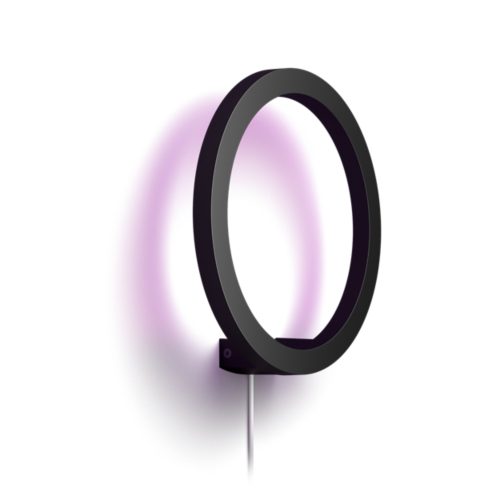 Black circular wall lamp with a matte finish, featuring a compact ring shape and a visible power cord at the base.