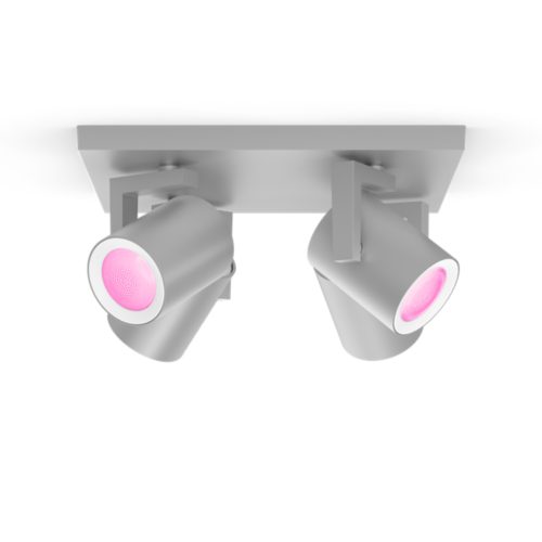 Ceiling-mounted spiral-shaped aluminium spotlight fixture with a matte finish, featuring adjustable cylindrical heads emitting pink light.