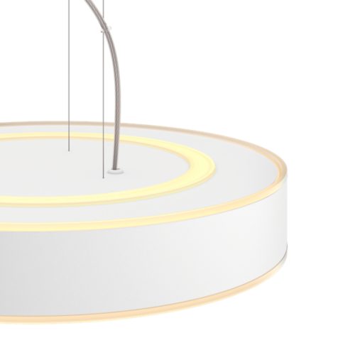 Close-up of a white circular pendant light with a smooth matte surface, illuminated yellow ring accents, and metal suspension cables.