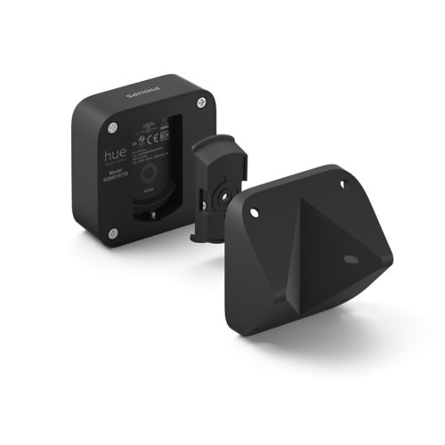Black outdoor sensor with a compact square shape, matte finish, visible setup button, and mounting bracket with screw holes.