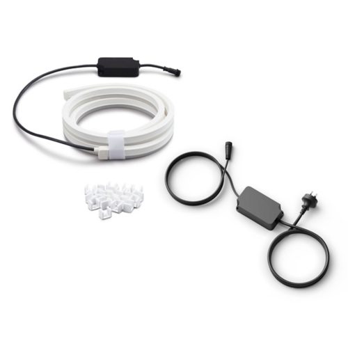Coiled white smart light strip, black power adapter with cable, and a collection of white mounting clips on a white background.
