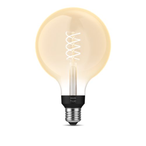 Large round filament smart bulb with clear glass, visible spiral filament, metallic screw base, and matte black socket with text.
