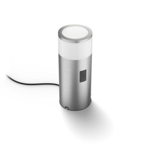 Calla pedestal light, cylindrical shape, silver metallic finish with white top, visible power cord and compact design.