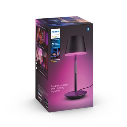 Product packaging showing a portable table lamp with a black shade, illuminated in pink light, and text reading Bring personalised smart lighting anywhere.