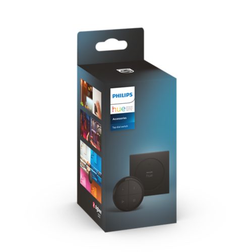 Product packaging showing a black round tap dial switch with four buttons, matte finish, and compact shape. Text reads Tap dial switch.