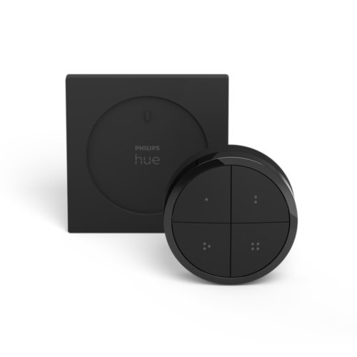Black Tap dial switch with a circular shape, matte finish, four buttons with tactile dots, and a compact square mounting plate.