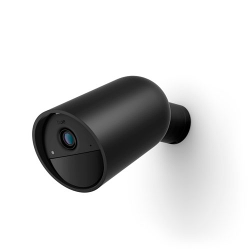 Battery-powered Hue Secure Cam in black, cylindrical shape with matte finish, lens and indicator visible on the front.