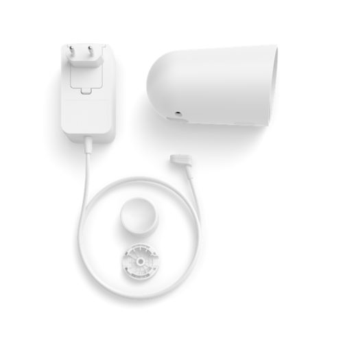 White smart security camera, power adapter with cable, mounting base, and circular component displayed on a white background.