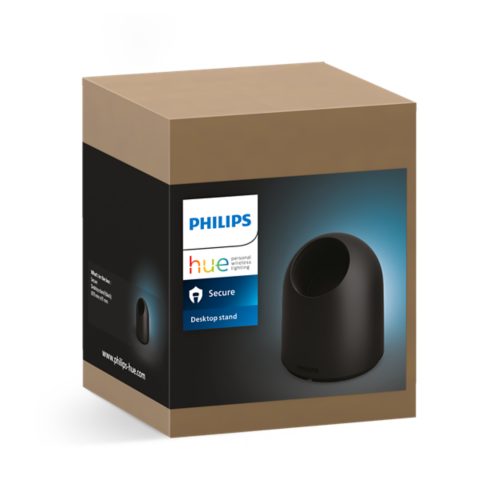 Brown and black packaging box showing a black desktop stand with product text: Secure Desktop stand on the front.