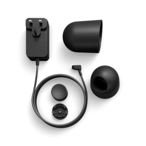 Collection of black wired desktop stand components, including power adapter, cable, mounting parts and camera housing, on white background.