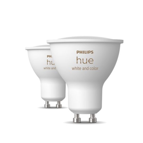 White GU10-shaped smart light bulbs with matte finish, metallic pins, and hue white and color text printed on the surface.