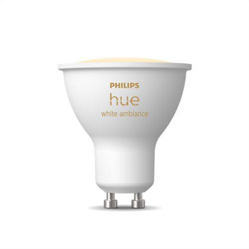 White GU10-shaped smart bulb with metallic base, compact design, matte finish, and hue white ambiance text on the front.
