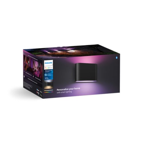 Product packaging featuring a black wall light with purple illumination and visible text: Personalize your home with smart lighting.