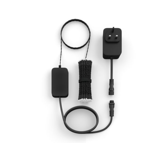 A collection of black string lights, power adapter, and control unit with visible connectors arranged on a white background.