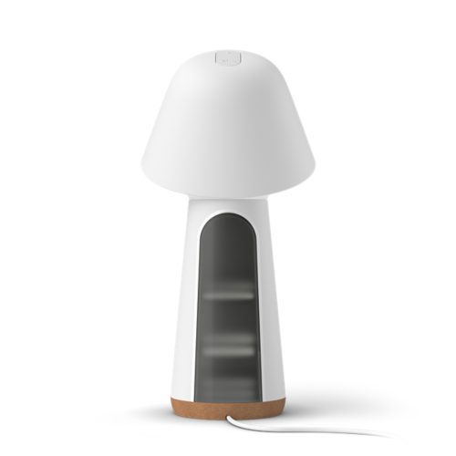Twilight bedside lamp with a mushroom-shaped white matte finish, compact design, glass front panel, and visible power cord.