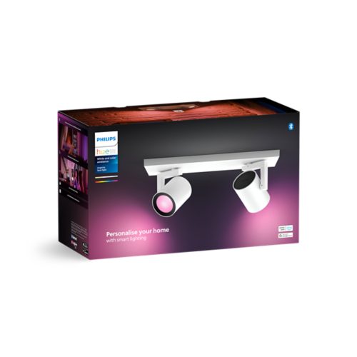 Product packaging showing a white dual spotlight fixture with pink and purple lighting effects and the text Personalise your home.