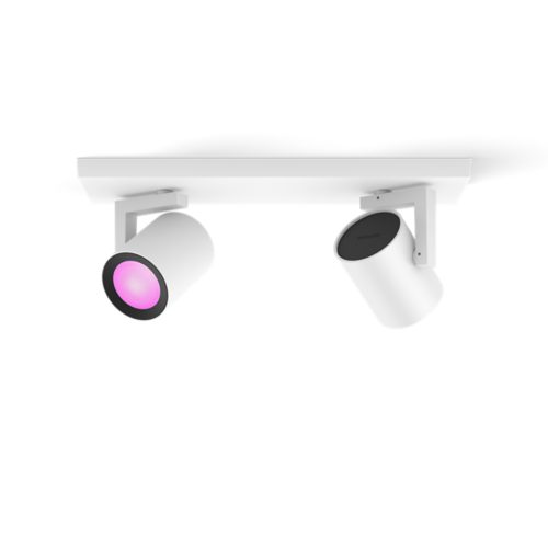 White compact motion sensor with rounded edges, matte finish, central dome-shaped lens, and a small circular indicator above.