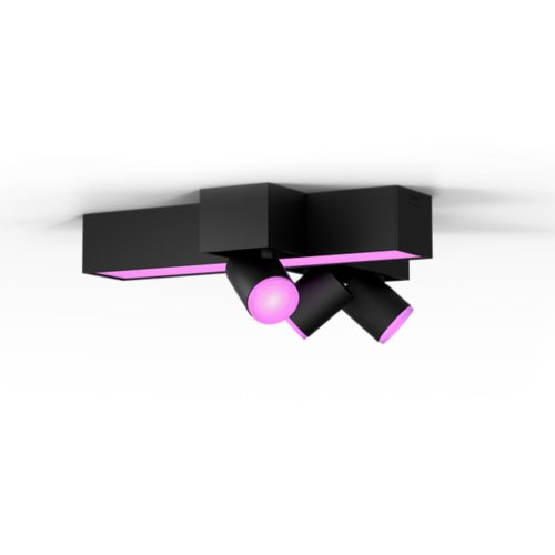 Black Centris cross-shaped ceiling spotlight with three cylindrical adjustable heads and pink illuminated ends, matte finish.