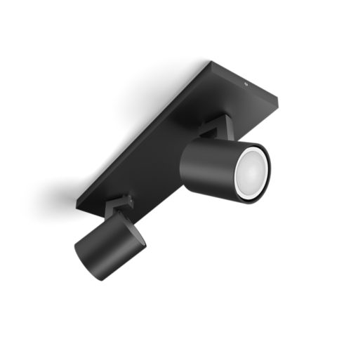 Black Runner bar tube ceiling light with cylindrical shape, matte finish, and two adjustable spotlight heads visible.