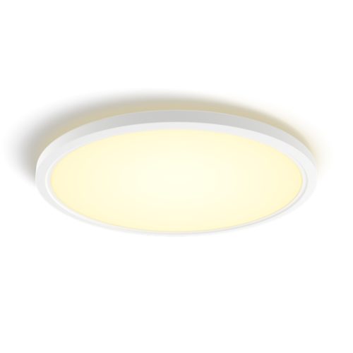 Tento Hue slim ceiling light, round shape, white finish, compact design, illuminated with a soft yellow glow, no visible switches.