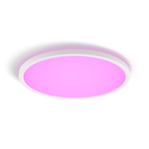 Slim round ceiling light with a white frame and pink illuminated surface, featuring a compact design and smooth matte finish.