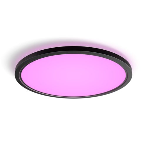 Slim round ceiling light with a black matte finish, emitting a pink glow, featuring a compact and minimalistic design.