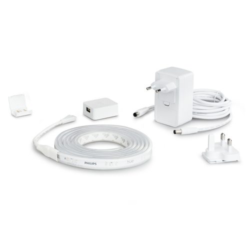 A coiled white LED light strip, power adapter with cable, connector, adapter plug, and a small rectangular control unit.