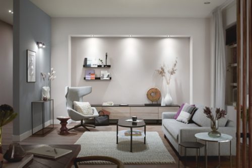 Slim round white ceiling light with a matte finish, featuring a compact design and smooth circular edges, no visible switches or ports.