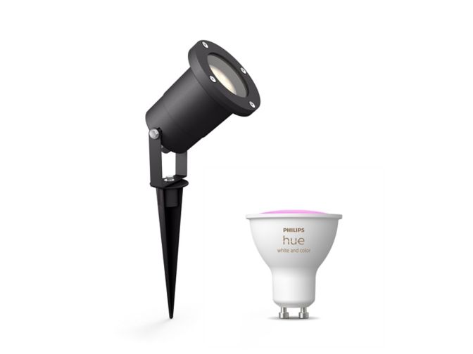 Close-up van de voorkant van Puled opbouwspot in zwart + GU10-lamp met gekleurd licht