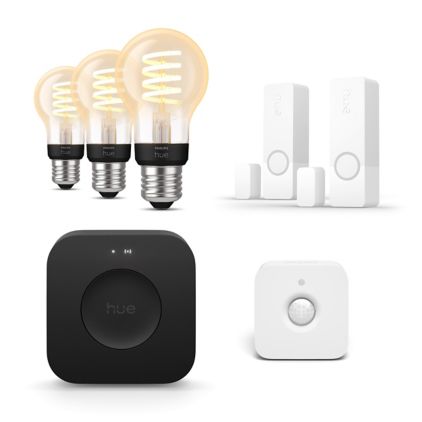 Primo piano della parte anteriore di 2 sensori di contatto Secure bianchi + sensore di movimento + Bridge Pro + 3 lampadine E27 A60 W 800 lm