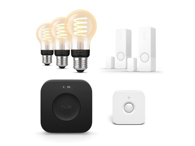 Close-up van de voorkant van 2 Secure contact sensoren in wit + motion sensor + Bridge Pro + 3 E27 A60 White lampen 800lumen